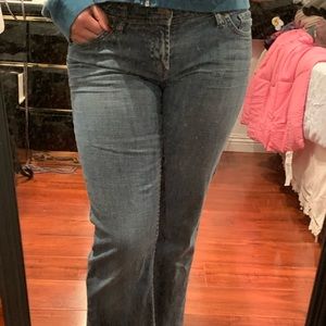 low rise jeans that are flared a little bit at the end